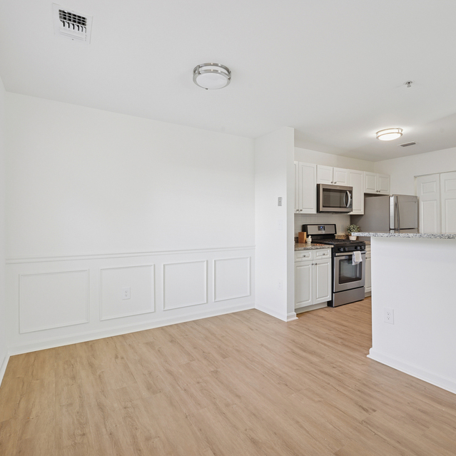 The Estates - Open Living Area With Kitchen View