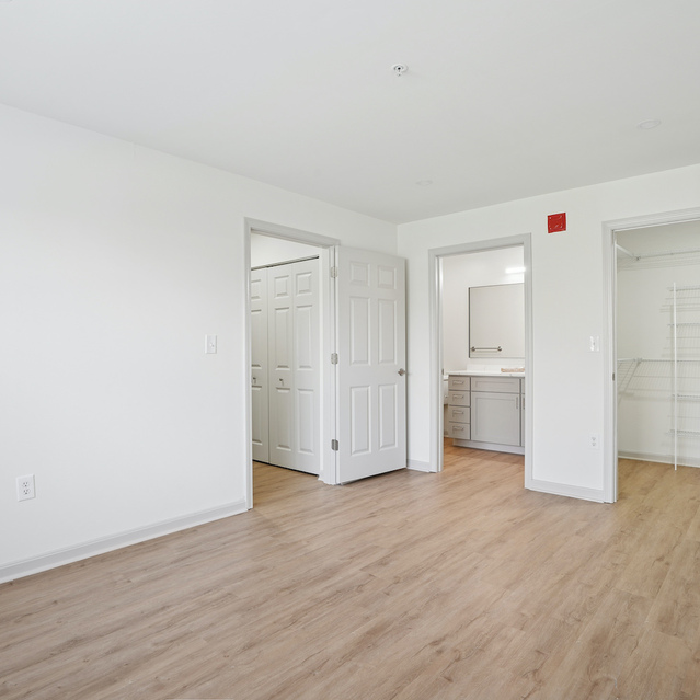 The Estates - Spacious Bedroom With Wood Floors And Closet